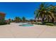 Resort-style community pool area with a built-in spa and lush landscaping for a relaxing and luxurious outdoor experience at 1367 S Country Club Dr # 1167, Mesa, AZ 85210