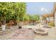 This home features an in ground pool and outdoor entertaining space in its backyard at 1391 W Windhaven Ave, Gilbert, AZ 85233