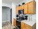 Well-equipped kitchen with stainless steel appliances, ample counter space, and modern cabinetry at 14752 W Evans Dr, Surprise, AZ 85379