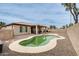 Aerial shot of kidney-shaped pool with tan surround and covered patio area at 14752 W Evans Dr, Surprise, AZ 85379
