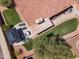 Aerial view of backyard featuring an outdoor seating area, barbecue, and pristine artificial grass at 15011 S 27Th Pl, Phoenix, AZ 85048