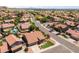 Aerial view of neighborhood showcasing tile roofs and manicured landscapes with an eye to the community at 15011 S 27Th Pl, Phoenix, AZ 85048