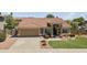 Charming single-story home with a well-manicured lawn, lovely landscaping, and a welcoming facade at 15011 S 27Th Pl, Phoenix, AZ 85048