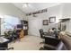 Inviting office featuring two workstations, tiled flooring, vaulted ceiling, and lots of natural light at 15011 S 27Th Pl, Phoenix, AZ 85048