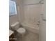 A bathroom with a shower and a toilet at 15446 W Jenan Dr, Surprise, AZ 85379