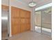 Bright dining area with wood cabinets and sliding glass doors at 15806 N 107Th Pl, Scottsdale, AZ 85255