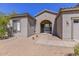 Charming desert home with well-maintained gravel landscaping and a cozy entrance at 15806 N 107Th Pl, Scottsdale, AZ 85255