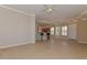 Open-concept living room with a breakfast bar and tile floors at 15806 N 107Th Pl, Scottsdale, AZ 85255