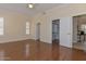 Large main bedroom boasting hardwood floors and neutral wall color at 15806 N 107Th Pl, Scottsdale, AZ 85255