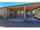 Charming covered patio with tiled flooring and exterior access at 15806 N 107Th Pl, Scottsdale, AZ 85255
