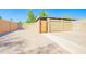 Private backyard with paver patio, block fencing and alley access at 1726 W Claremont St, Phoenix, AZ 85015