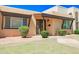 Inviting single story home featuring low maintenance landscaping and charming walkway at 1726 W Claremont St, Phoenix, AZ 85015