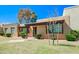 Single story home with mature trees and low maintenance landscaping at 1726 W Claremont St, Phoenix, AZ 85015