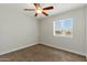 This well-lit bedroom offers a view of the neighborhood through the window at 1741 S Clearview Ave # 74, Mesa, AZ 85209