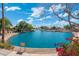 Picturesque lake view in a tranquil community setting with lush landscaping and serene waters at 1741 S Clearview Ave # 74, Mesa, AZ 85209