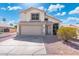 Charming two-story home with a two-car garage, well-maintained landscaping, and beautiful blue sky at 1741 S Clearview Ave # 74, Mesa, AZ 85209