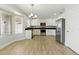 Modern kitchen with white cabinets, stainless steel appliances, and a large window offering ample light at 1741 S Clearview Ave # 74, Mesa, AZ 85209