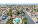 An aerial shot showcases a community pool, surrounded by lush landscaping and residences at 1811 S 39Th St # 30, Mesa, AZ 85206