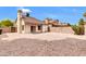 Low maintenance backyard with stone ground cover, block wall fencing, and covered patio at 1811 S 39Th St # 30, Mesa, AZ 85206