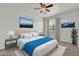 Brightly staged bedroom with furniture, including a queen bed and bedside tables at 1811 S 39Th St # 30, Mesa, AZ 85206