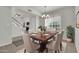Dining room boasting large window, stylish furnishings, and open layout at 1811 S 39Th St # 30, Mesa, AZ 85206