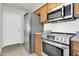 Well-lit kitchen with stainless steel appliances and granite countertops for a modern aesthetic at 1811 S 39Th St # 30, Mesa, AZ 85206