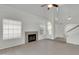 Vaulted ceilings complement this comfortable living room complete with fireplace and abundant natural light at 1811 S 39Th St # 30, Mesa, AZ 85206