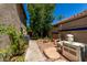 View of side yard of the property with hardscape and AC units at 21614 N 59Th Ln, Glendale, AZ 85308