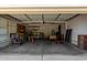 Spacious two car garage with shelving, lighting and plenty of room for storage at 21614 N 59Th Ln, Glendale, AZ 85308