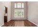 Bright, open room with high ceilings and large windows with shutters for ample natural light at 21614 N 59Th Ln, Glendale, AZ 85308