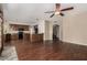 Open-concept space featuring a kitchen with stainless appliances and a spacious seating area at 21614 N 59Th Ln, Glendale, AZ 85308