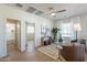 Cozy living room featuring modern decor, natural light, and an open doorway to a bathroom at 2195 N Peden Dr, Chandler, AZ 85225