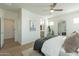 Bright and airy main bedroom with hardwood floors and white paint throughout at 2195 N Peden Dr, Chandler, AZ 85225