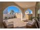 Outdoor patio with seating, brick floor, and open air archways at 2195 N Peden Dr, Chandler, AZ 85225