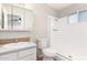 Bright bathroom with vanity, toilet, and walk-in shower at 2242 W Pecan Rd, Phoenix, AZ 85041