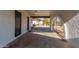 Attached carport offering secure gated access to the front of the home at 2242 W Pecan Rd, Phoenix, AZ 85041