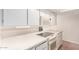 Kitchen featuring a microwave, oven, and stove top appliances with white cabinetry at 2242 W Pecan Rd, Phoenix, AZ 85041