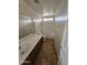This bathroom boasts a tub and tiled floors at 22872 W Gardenia Dr, Buckeye, AZ 85326