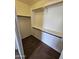 Walk-in closet offers ample storage with built in shelving at 22872 W Gardenia Dr, Buckeye, AZ 85326
