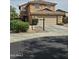 Charming two-story home featuring a tile roof, two car garage and well-maintained landscaping at 22872 W Gardenia Dr, Buckeye, AZ 85326