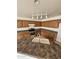 Well-lit kitchen with stainless steel appliances, wrap around countertops and wood cabinets at 22872 W Gardenia Dr, Buckeye, AZ 85326