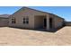 Picture of a home's backyard with block wall and dirt ground at 24486 W Grenadine Rd, Buckeye, AZ 85326