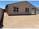 Picture of a home's backyard with block wall and dirt ground at 24486 W Grenadine Rd, Buckeye, AZ 85326