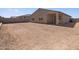 New home construction featuring a spacious backyard with the potential for landscaping and outdoor living at 24486 W Grenadine Rd, Buckeye, AZ 85326