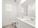 Bathroom featuring a dual vanity, tile floors, and a shower at 24486 W Grenadine Rd, Buckeye, AZ 85326