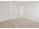 Bedroom featuring carpeted floors and closet with sliding doors at 24486 W Grenadine Rd, Buckeye, AZ 85326