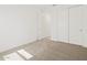 Bedroom featuring carpeted floors and closet with sliding doors at 24486 W Grenadine Rd, Buckeye, AZ 85326