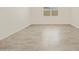 Bright living room featuring tile floors, recessed lighting, and natural lighting at 24486 W Grenadine Rd, Buckeye, AZ 85326