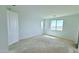 A bright bedroom with large windows offering outside views at 25130 N 156Th Ln, Surprise, AZ 85387