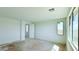Well-lit bedroom with neutral walls and a window overlooking the side yard at 25130 N 156Th Ln, Surprise, AZ 85387